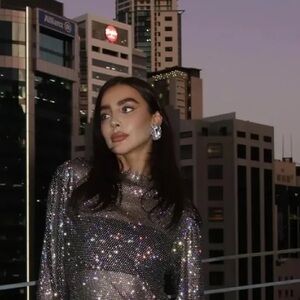 Heiress embellished mesh and feather top